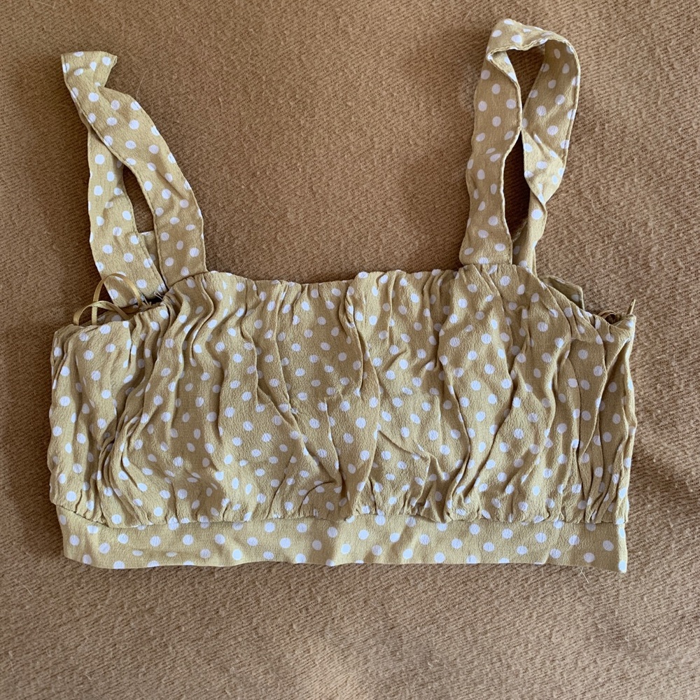 Yellow polka-dot cropped top
